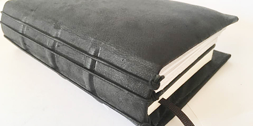 Traveler´s Notebook A6 mit schwarzem Leder handgebunden Buchbinden